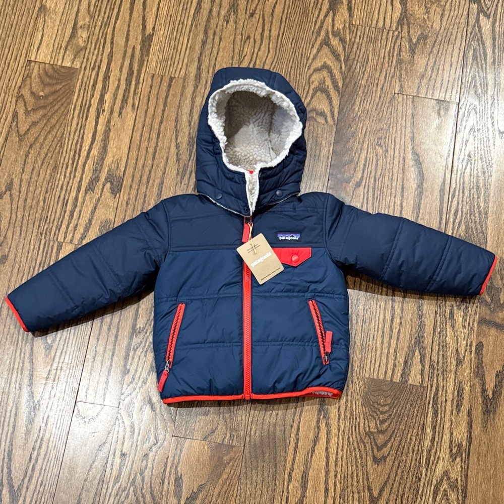 Patagonia Dark Blue Hooded Jacket with Bright Red Trim